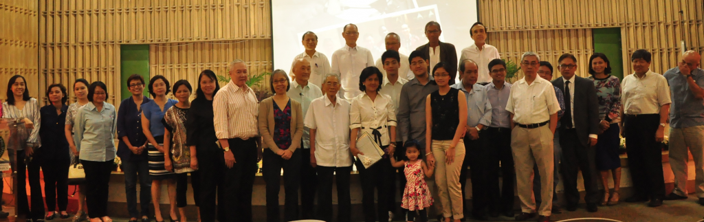 The family of the late Chairman Cayetano Paderanga Jr., which was led by wife Delia, poses for a group shot with UP colleagues at the university's School of Economics after the necrological program. 